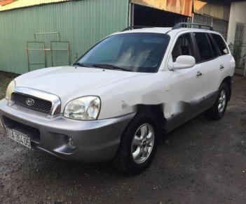 Hyundai Santa Fe MT 2005 - Bán ô tô Hyundai Santa Fe MT năm sản xuất 2005, màu trắng