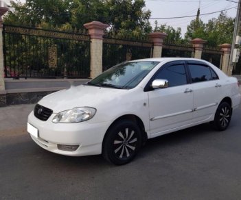 Toyota Corolla altis 1.8G 2004 - Cần bán gấp Toyota Corolla Altis 1.8G đời 2004, màu trắng số sàn