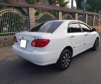 Toyota Corolla altis 1.8G 2004 - Cần bán gấp Toyota Corolla Altis 1.8G đời 2004, màu trắng số sàn