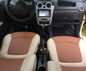 Chevrolet Spark MT 2009 - Cần bán xe Chevrolet Spark Mt sản xuất năm 2009, màu vàng chính chủ, giá 115tr