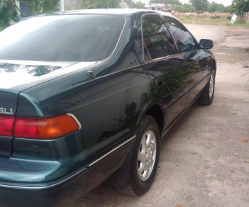 Toyota Camry GLI 1998 - Bán xe Toyota Camry GLI đời 1998, màu xanh lục, 250tr