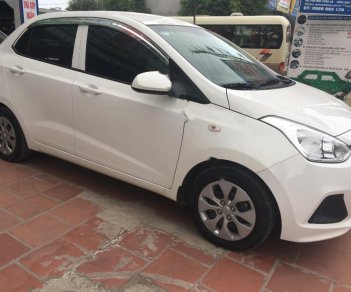 Hyundai Grand i10 1.2 MT Base 2016 - Bán ô tô Hyundai Grand i10 1.2 MT Base 2016, màu trắng, nhập khẩu như mới