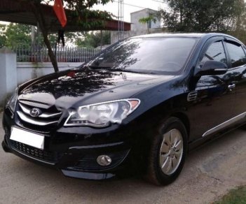 Hyundai Avante 1.6 MT 2013 - Gia đình bán xe Hyundai Avante 1.6 MT năm 2013, màu đen