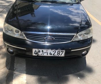 Ford Laser 2004 - Bán lại xe Ford Laser 2004, màu đen, xe nhập