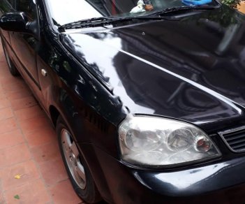 Daewoo Lacetti EX 1.6 MT 2005 - Cần bán lại xe Daewoo Lacetti EX 1.6 MT đời 2005, màu đen  