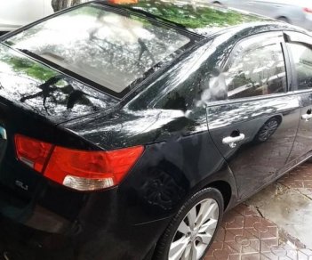 Kia Forte SLi 1.6 AT 2010 - Bán Kia Forte SLI 2010, màu đen, xe nhập chính chủ