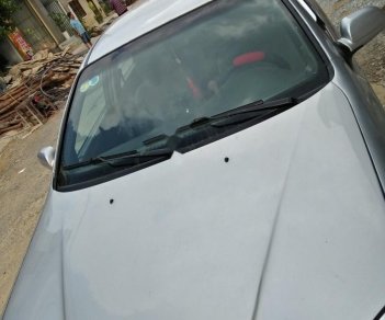 Daewoo Lacetti EX 1.6 MT 2005 - Cần bán gấp Daewoo Lacetti EX 1.6 MT năm sản xuất 2005, màu bạc