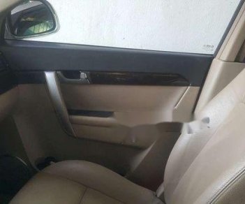 Chevrolet Captiva LT 2009 - Cần bán lại xe Chevrolet Captiva LT sản xuất năm 2009, màu vàng chính chủ, giá tốt