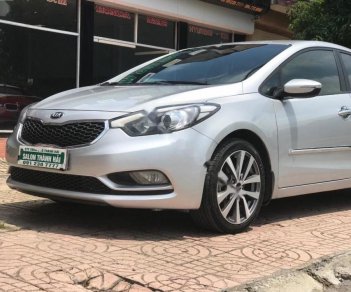 Kia K3 MT 2014 - Bán Kia K3 MT năm 2014, màu bạc số sàn, giá tốt