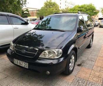 Kia Carnival GS 2.5 AT 2009 - Bán Kia Carnival GS 2.5 AT sản xuất 2009, màu đen