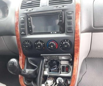 Kia Carnival 2005 - Cần bán lại xe Kia Carnival 2005, màu bạc