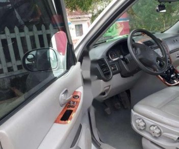 Kia Carnival 2005 - Cần bán lại xe Kia Carnival 2005, màu bạc