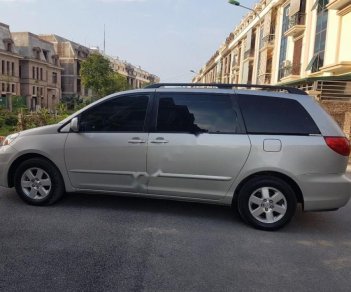 Toyota Sienna LE 3.5 2009 - Bán Toyota Sienna LE 3.5 năm 2009, màu bạc, nhập khẩu 