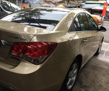 Chevrolet Cruze LTZ 1.8 AT 2014 - Cần bán lại xe Chevrolet Cruze LTZ 1.8 AT đời 2014, màu vàng, 430 triệu