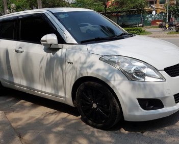 Suzuki Swift  1.4 AT  2015 - Bán xe Suzuki Swift 1.4 AT năm sản xuất 2015, màu trắng 