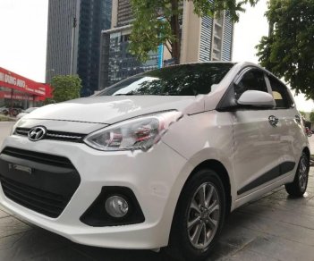 Hyundai Premio 1.2 AT 2015 - Bán ô tô Hyundai Grand i10 1.2 AT đời 2015, màu trắng, nhập khẩu nguyên chiếc như mới