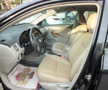 Toyota Corolla XLI 1.6 2011 - Cần bán lại xe Toyota Corolla XLI 1.6 năm 2011, màu đen, nhập khẩu chính chủ, 550tr