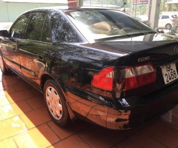 Mazda 626 2.0 MT 2000 - Bán xe Mazda 626 2.0 MT sản xuất 2000, màu đen, giá 142tr