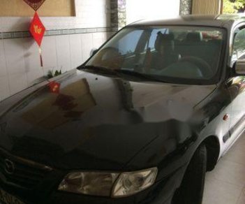 Mazda 626   2003 - Cần bán lại xe Mazda 626 2003, màu đen, 169 triệu