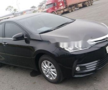 Toyota Corolla altis 2018 - Bán xe Toyota Corolla altis năm 2018, màu đen chính chủ, giá 730tr