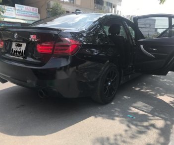 BMW 3 Series   320i 2013 - Cần bán gấp BMW 3 Series 320i năm sản xuất 2013, màu đen, 865 triệu