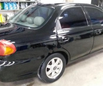 Kia Spectra 2004 - Bán Kia Spectra đời 2004, màu đen, 120 triệu