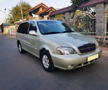 Kia Carnival GS 2.5 AT 2009 - Bán Kia Carnival GS 2.5 AT năm sản xuất 2009, màu vàng cát