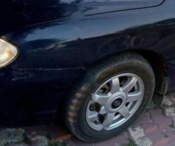 Kia Spectra 1.6 MT 2005 - Bán Kia Spectra 1.6 MT sản xuất năm 2005, màu đen xe gia đình