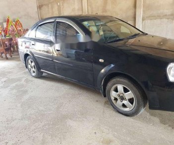 Daewoo Lacetti 2007 - Cần bán gấp Daewoo Lacetti sản xuất 2007, màu đen xe gia đình