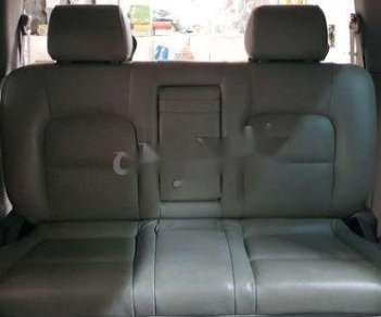 Kia Carnival 2005 - Cần bán Kia Carnival năm sản xuất 2005, màu đen xe gia đình, giá chỉ 340 triệu