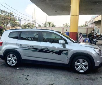 Chevrolet Orlando 2012 - Cần bán lại xe Chevrolet Orlando 2012, màu bạc, giá 410tr