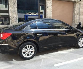 Chevrolet Cruze 1.6MT 2016 - Bán ô tô Chevrolet Cruze 1.6MT 2016, màu đen