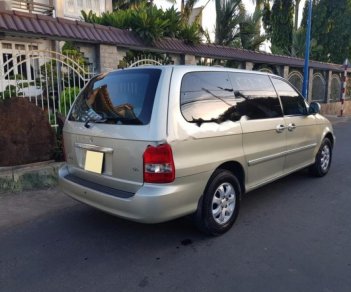 Kia Carnival GS 2.5 AT 2009 - Bán Kia Carnival GS 2.5 AT năm sản xuất 2009, màu vàng cát