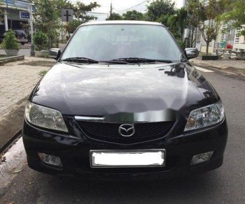 Mazda 323   2004 - Cần bán gấp Mazda 323 đời 2004, màu đen