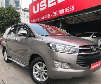 Toyota Innova 2.0E 2016 - Cần bán gấp Toyota Innova 2.0E năm 2016, màu nâu, 699 triệu