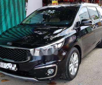 Kia Sedona 2016 - Cần bán xe Kia Sedona đời 2016, màu đen, giá tốt