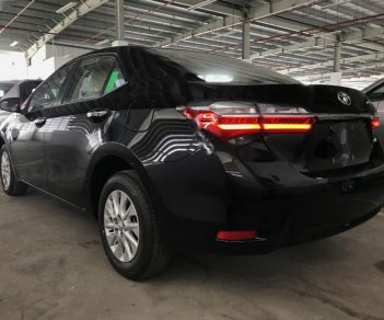 Toyota Corolla altis 1.8E AT 2018 - Bán ô tô Toyota Corolla altis 1.8E AT đời 2018, màu đen