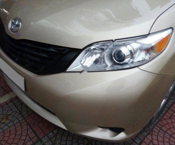 Toyota Sienna LE 2.7 2010 - Bán Toyota Sienna LE sản xuất 2010, màu vàng, nhập khẩu nguyên chiếc