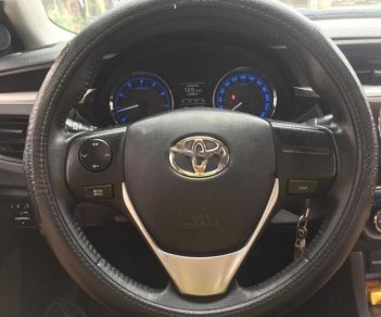 Toyota Corolla altis 1.8 2015 - Cần bán gấp Toyota Corolla altis 1.8 sản xuất năm 2015, màu đen như mới