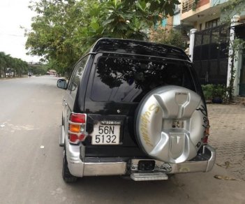 Mitsubishi Pajero 2004 - Cần bán Mitsubishi Pajero đời 2004, màu đen số sàn