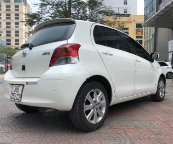 Toyota Yaris 1.3 AT 2009 - Bán Toyota Yaris 1.3 AT sản xuất năm 2009, màu trắng, nhập khẩu nguyên chiếc