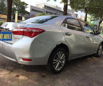 Toyota Corolla altis 1.8G AT 2016 - Bán xe Toyota Corolla altis 1.8G AT đời 2016, màu bạc, giá 695tr