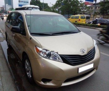 Toyota Sienna LE 2.7 2010 - Bán Toyota Sienna LE sản xuất 2010, màu vàng, nhập khẩu nguyên chiếc