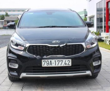 Kia Rondo GAT 2018 - Cần bán lại xe Kia Rondo GAT đời 2018, màu đen xe gia đình