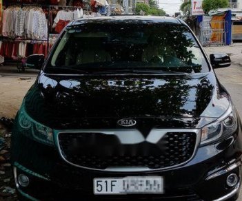 Kia Sedona 2016 - Cần bán xe Kia Sedona đời 2016, màu đen, giá tốt