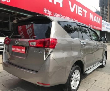 Toyota Innova 2.0E 2016 - Cần bán gấp Toyota Innova 2.0E năm 2016, màu nâu, 699 triệu