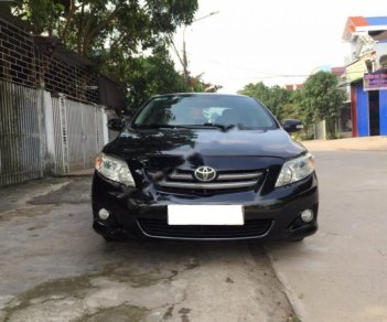 Toyota Corolla altis 1.8G MT 2009 - Bán ô tô Toyota Corolla altis 1.8G MT năm 2009, màu đen