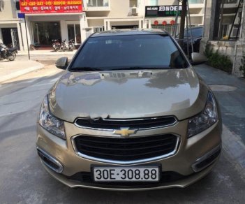 Chevrolet Cruze LT 1.6 MT 2015 - Bán xe Chevrolet Cruze LT 1.6 MT sản xuất năm 2015, màu vàng cát