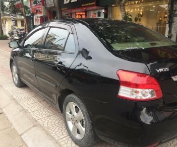 Toyota Vios 1.5E 2009 - Cần bán xe Toyota Vios 1.5 E đời 2009, màu đen