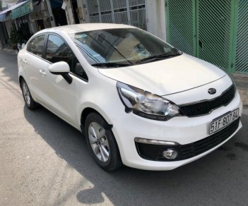 Kia Rio 1.4MT  2016 - Cần bán lại xe Kia Rio 1.4MT sản xuất năm 2016, màu trắng, nhập khẩu, xe gia đình, 415 triệu